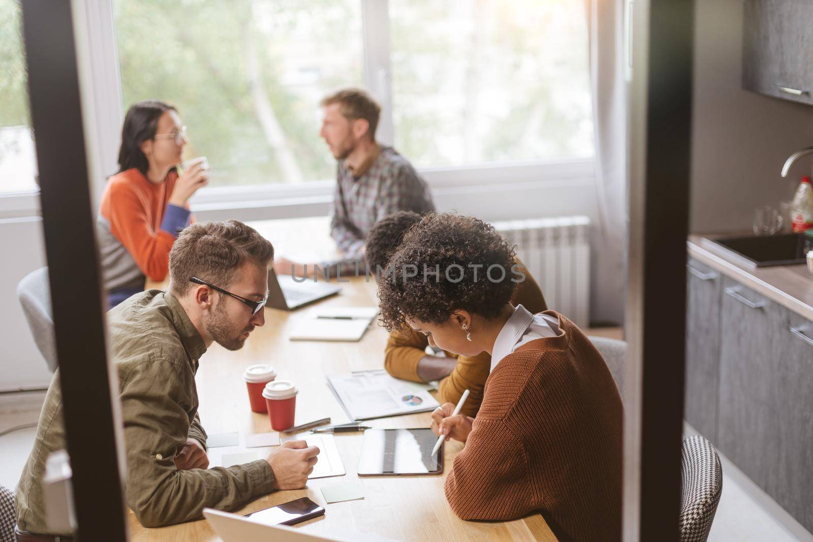 business people work locally in a coworking center. by SmartPhotoLab