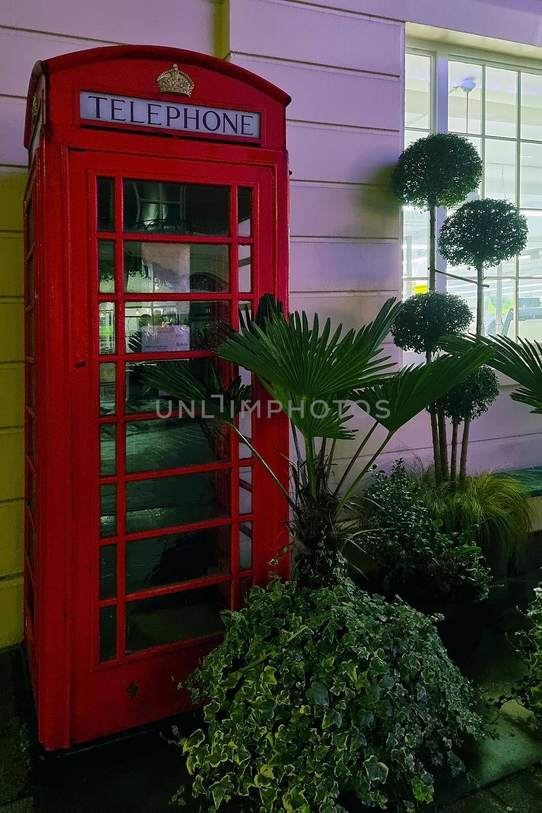 London, United Kingdom, February 5, 2022: the famous telephone booth on the streets of London. by kip02kas