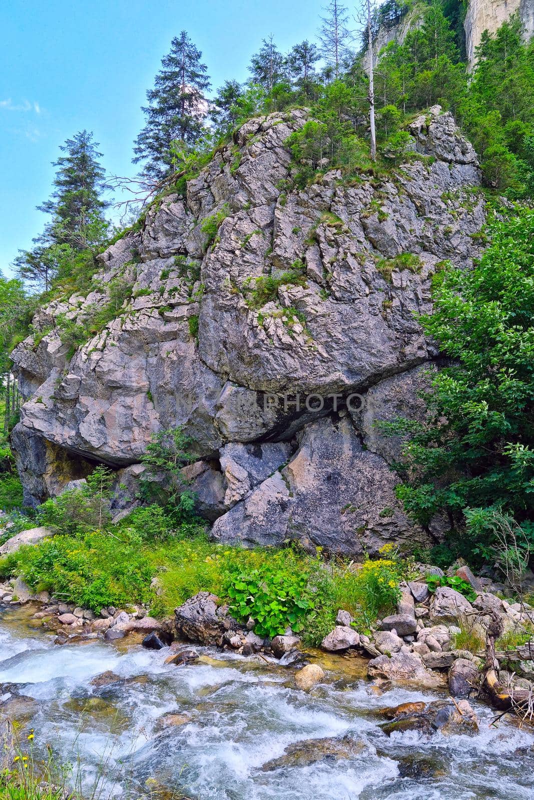 A picturesque view of the rocks and a small mountain river