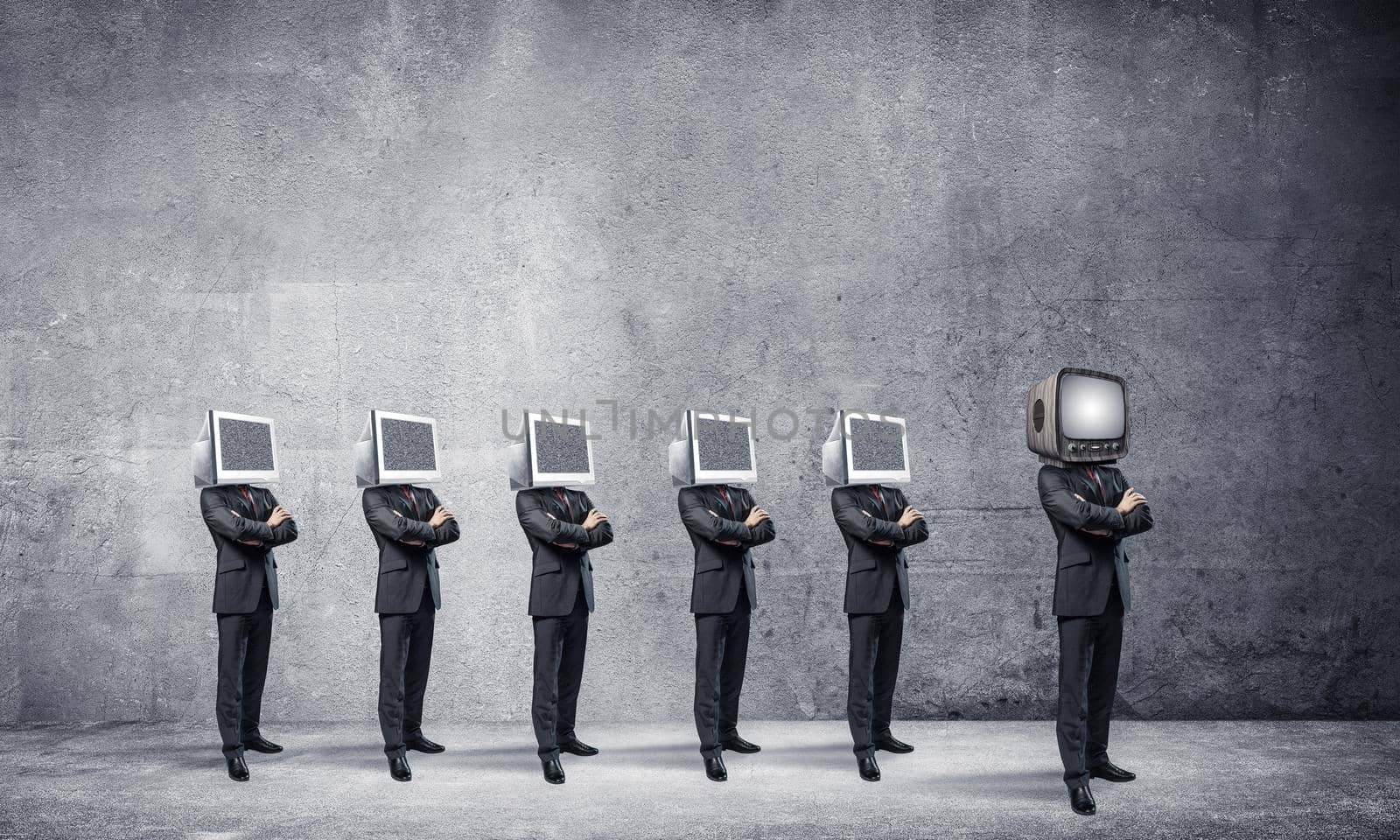 Businessmen in suits with monitors instead of their heads keeping arms crossed while standing in a row