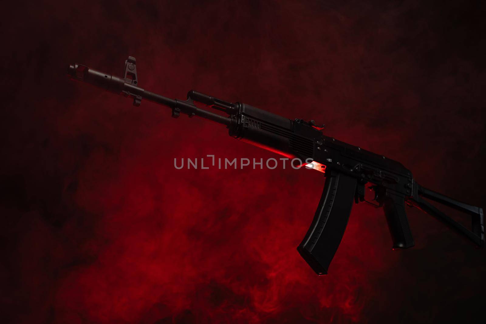 kalashnikov assault rifle in smoke by Rotozey