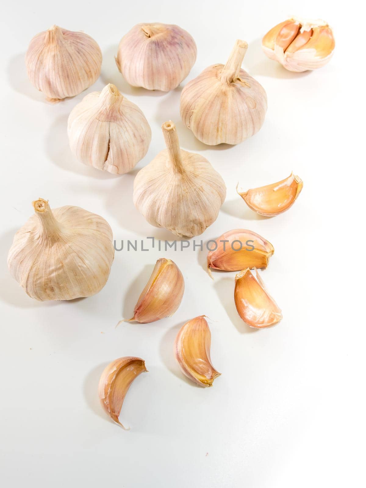 Garlics on white background, spice herb and food ingredient