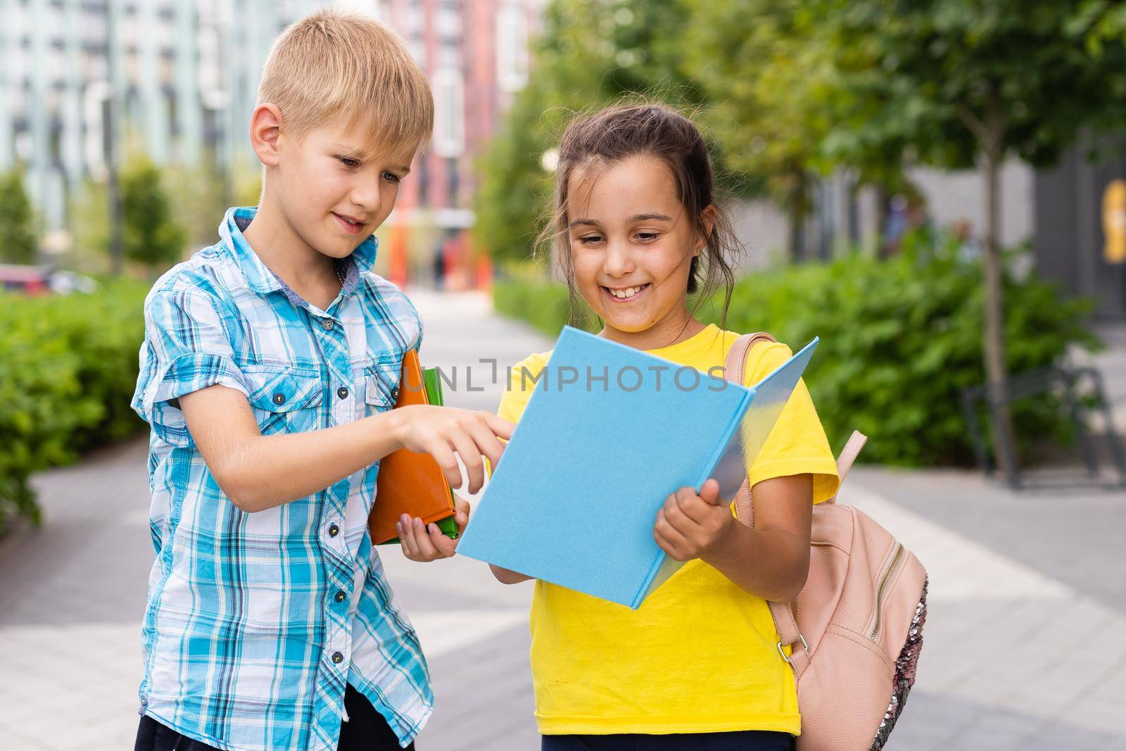 Portrait of smiling little school kids.