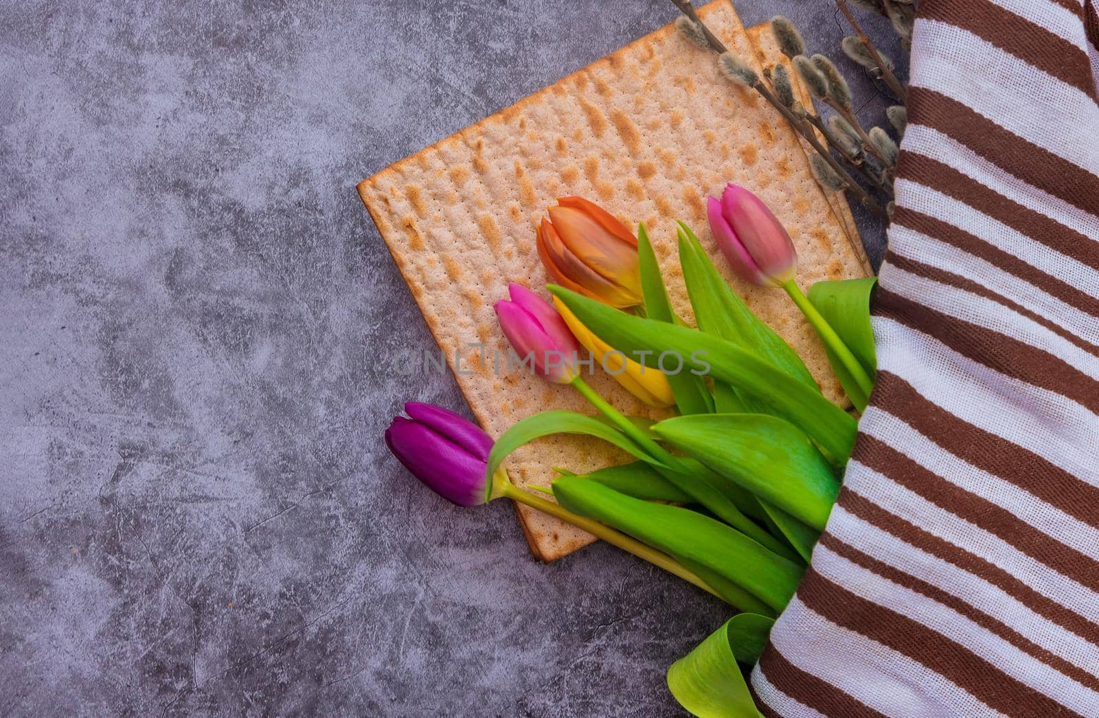 Pesach celebration holiday the flowers matzah bread with Jewish Passover