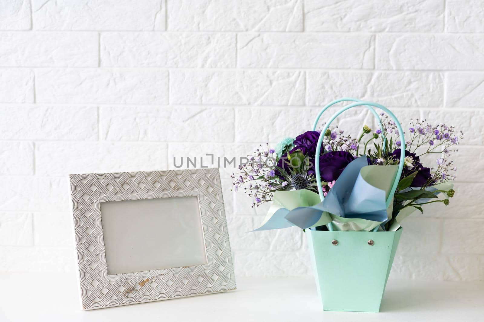 composition with vintage foto frame and purple bouquet by Andelov13