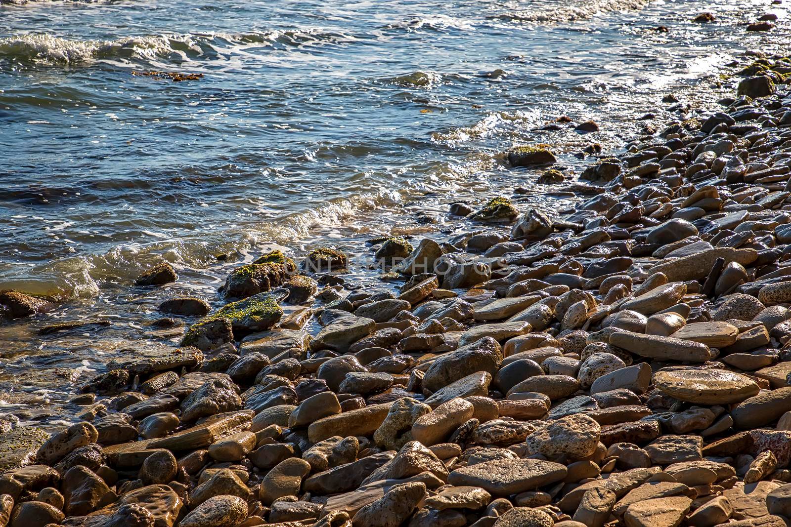 At a stone coastline at the Black sea. Relaxing horizontal view.