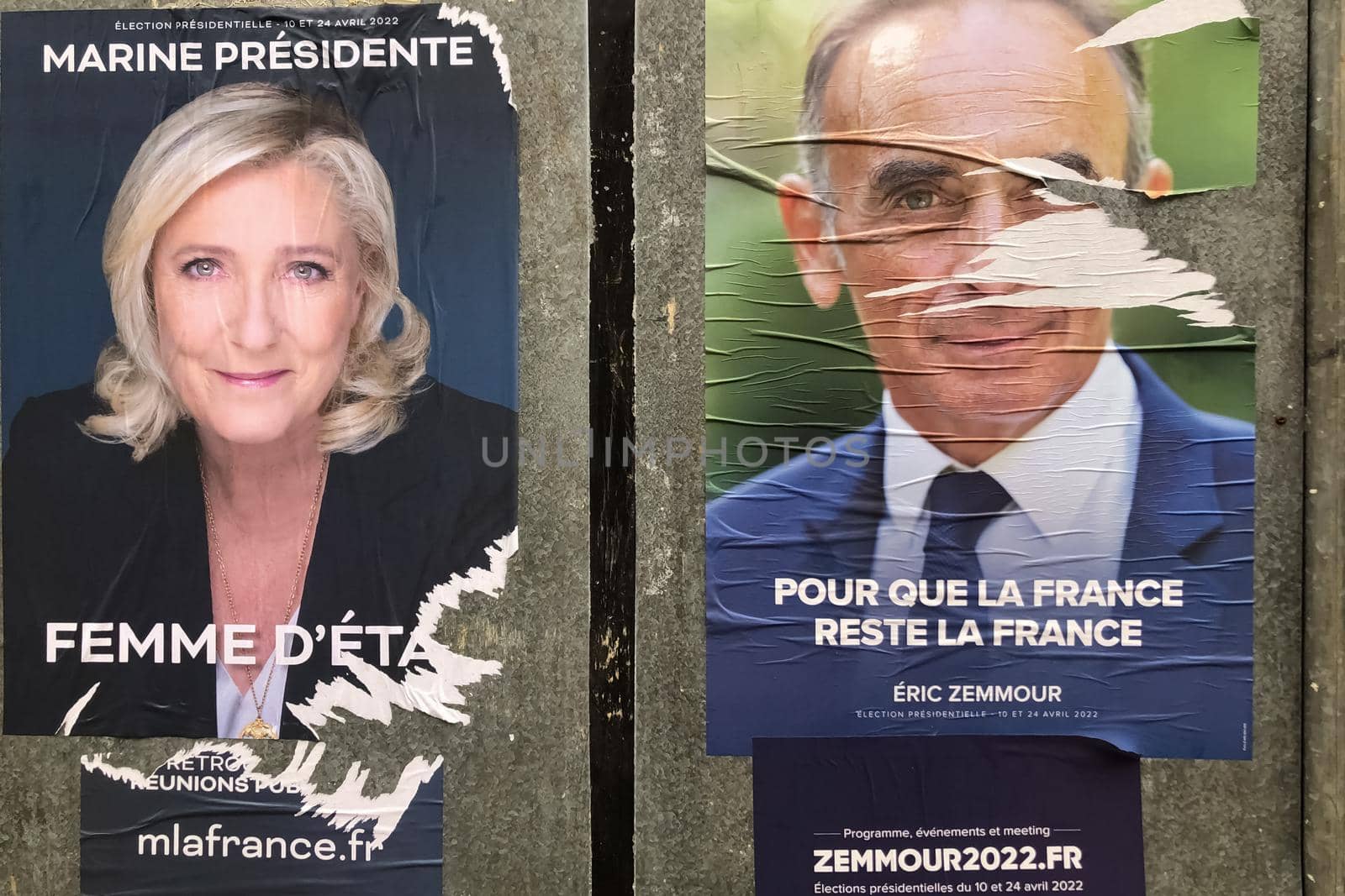 PARIS, FRANCE - APRIL 06, 2022 : The banners with candidates for President elections