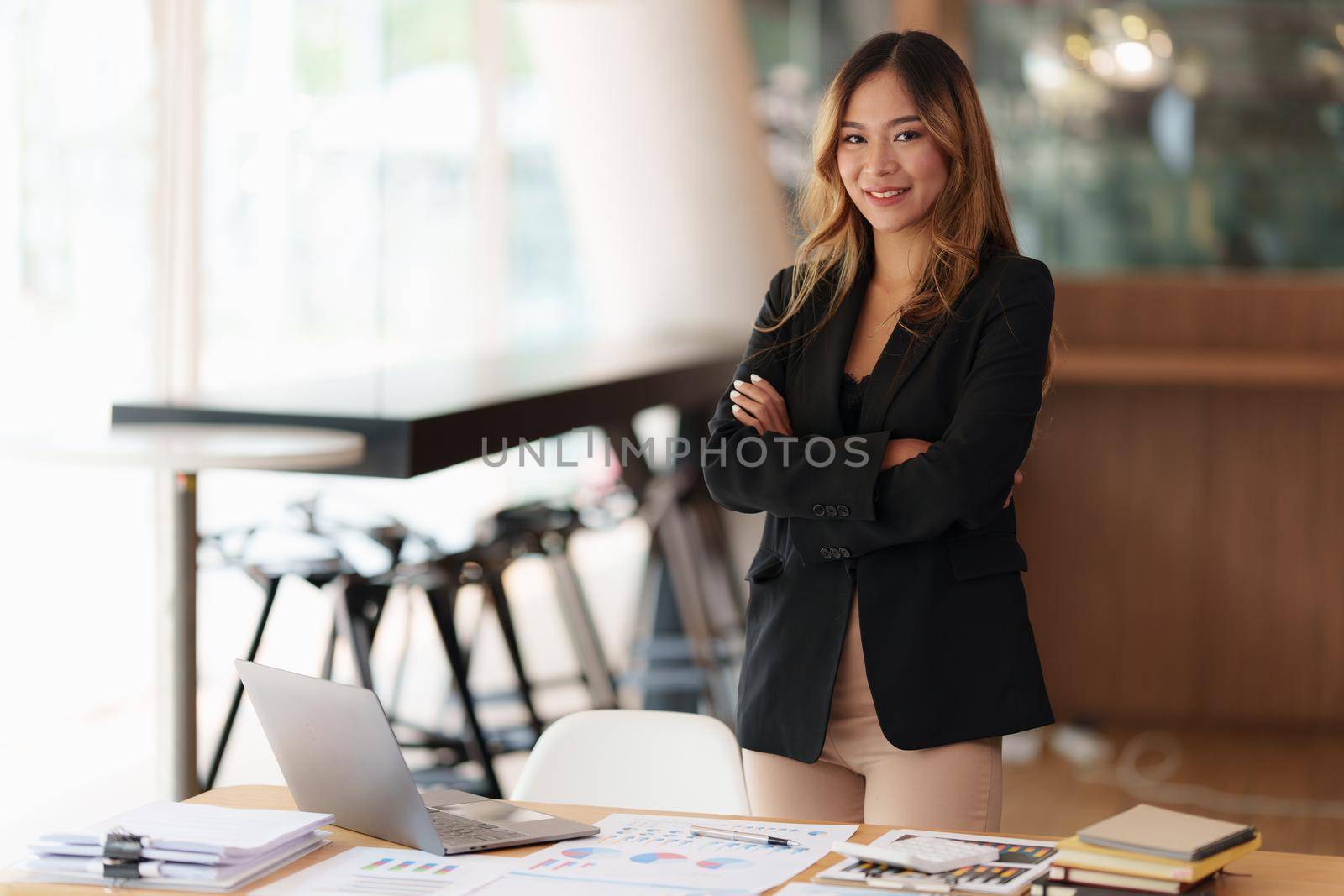 Modern Asian Business woman have confident working with financial at office. Accounting concept