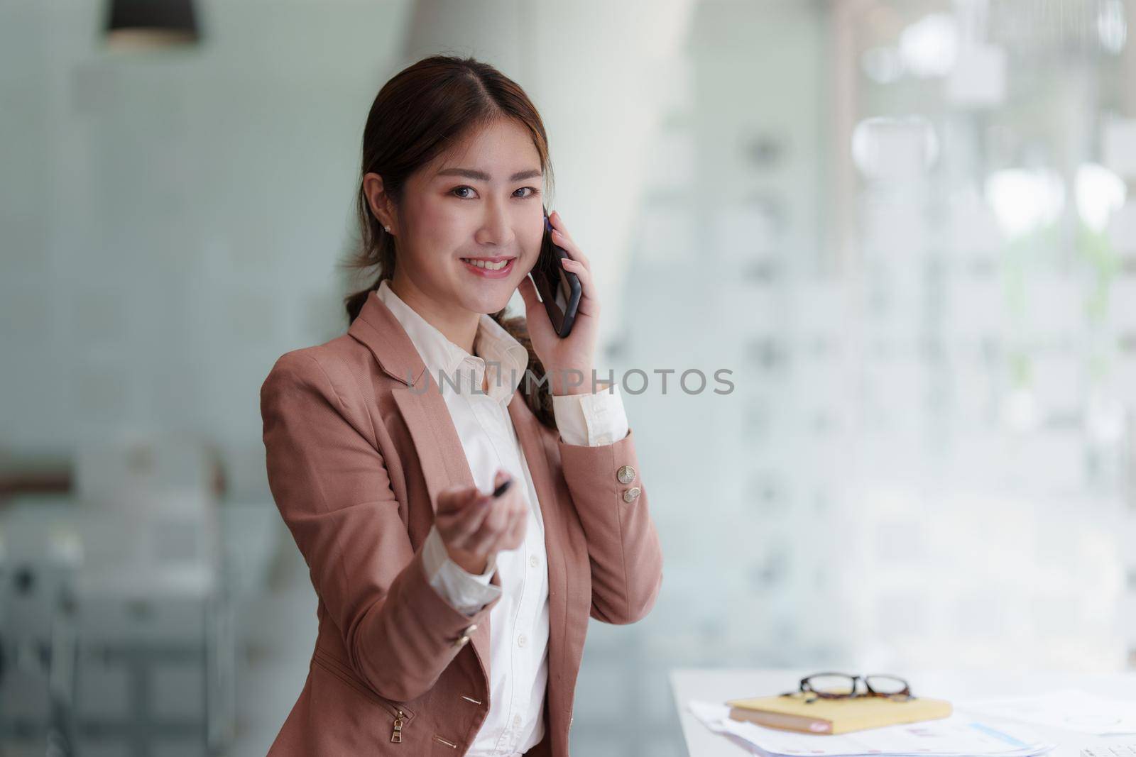 Modern Asian Business woman have confident working with financial at office. Accounting concept