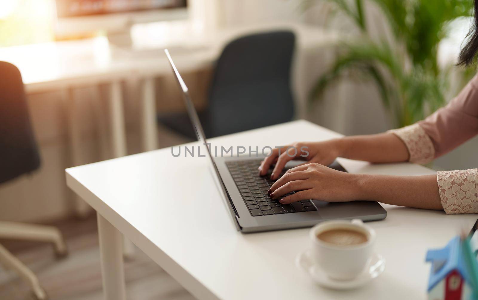 Close up asian woman using laptop computer at home.