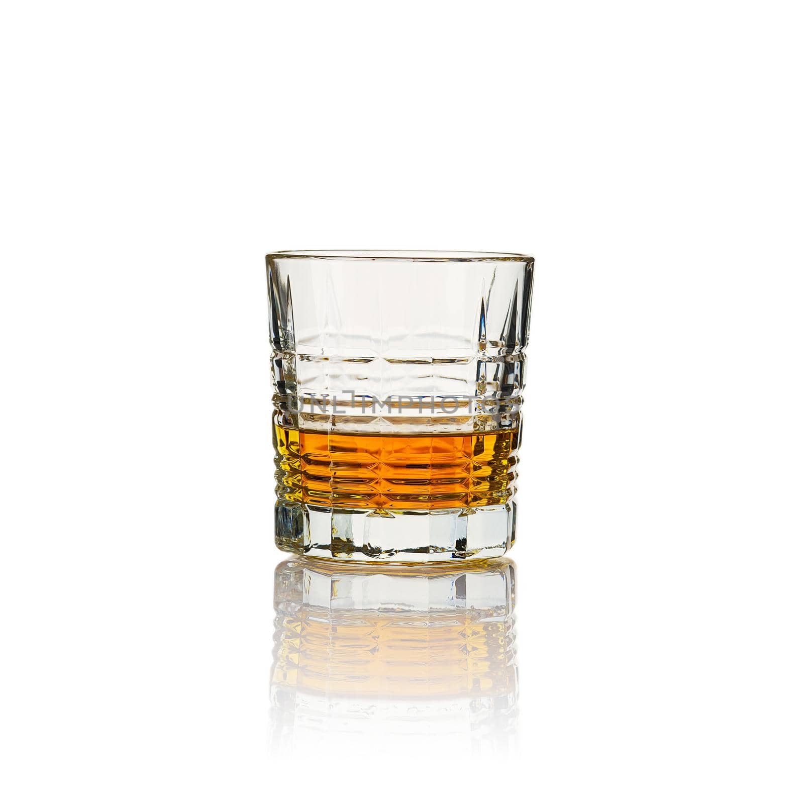Glass of whisky - without ice and reflection, studio shot by PhotoTime