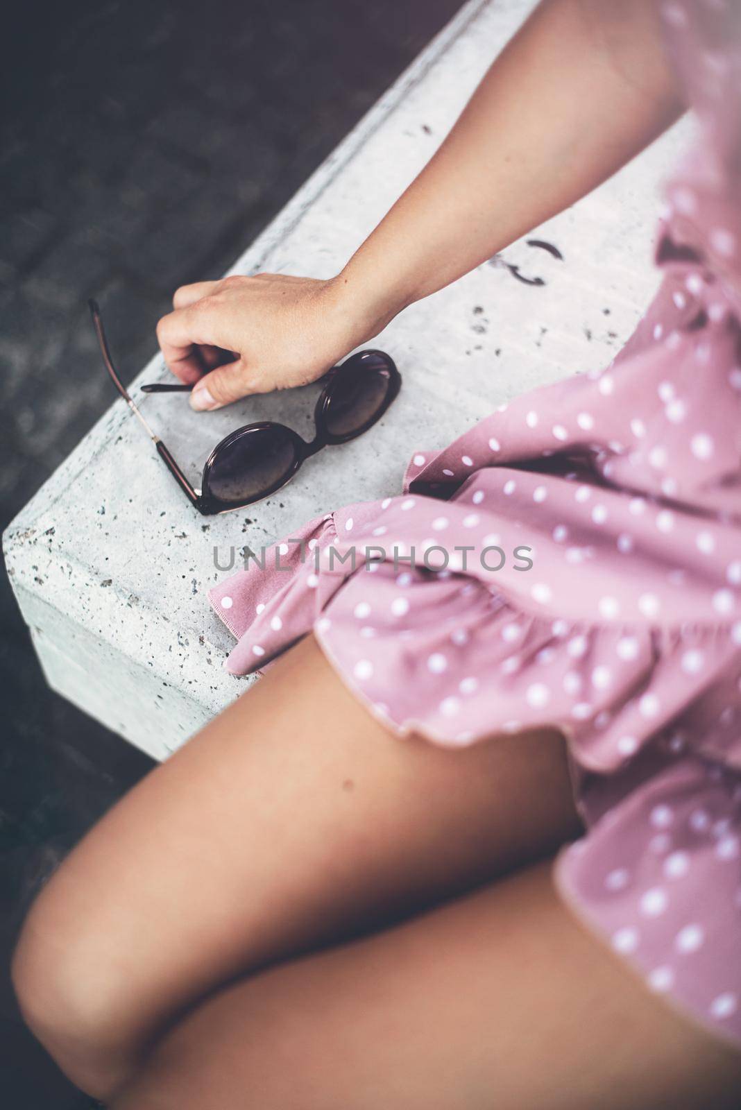 portrait of a beautiful woman a light violet sundress. vacation, enjoys life. soft light.