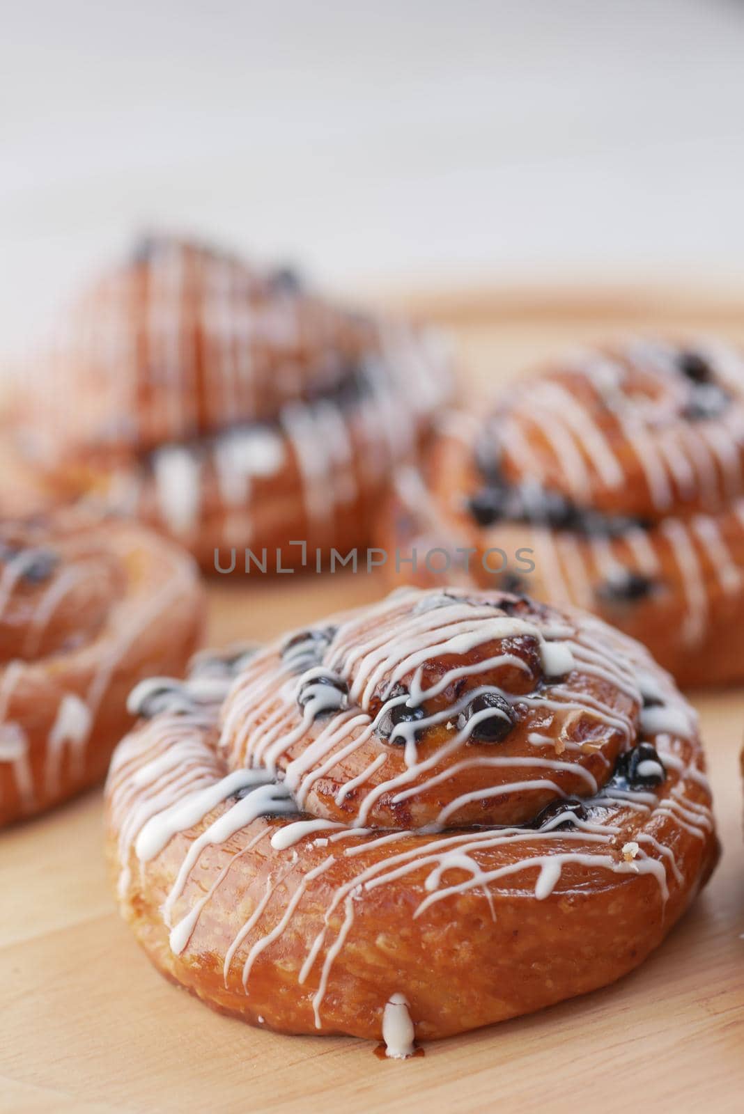 close up cinnamon danish roll on table .