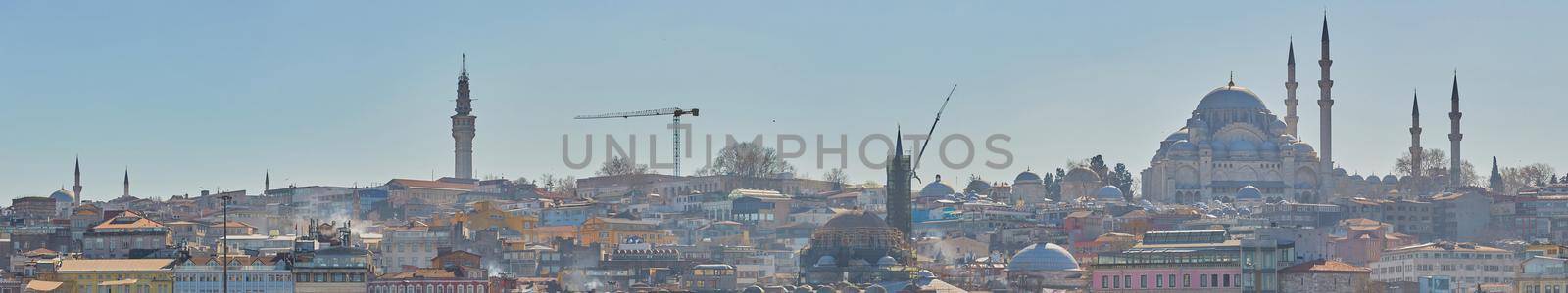 Istanbul, Turkey - 1 April, 2017: Panorama of Cityscape of Golden horn with ancient and modern buildings by sarymsakov