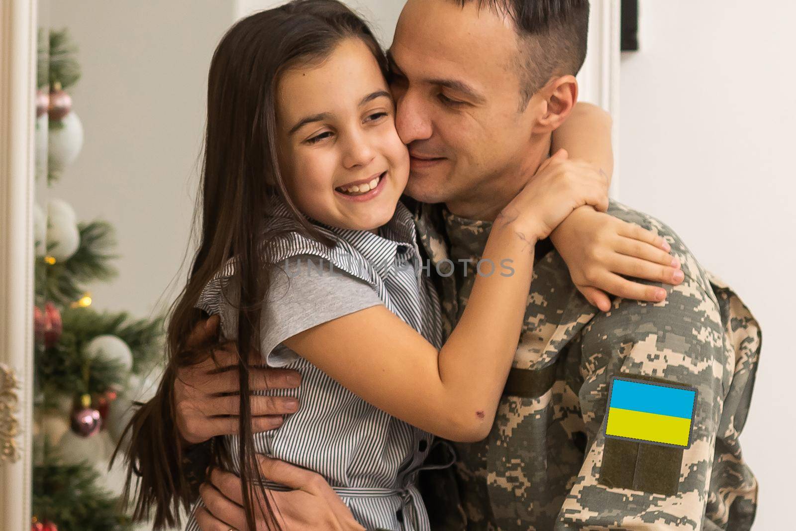 Happy Ukrainian soldier in military, cheerful daughter, Ukrainian veterans of Russian-Ukrainian, Independence Day by Andelov13