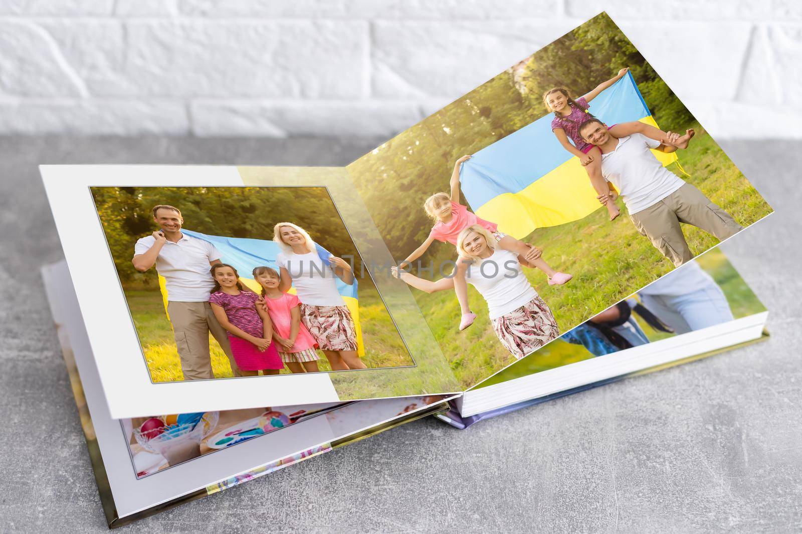 military family photo book with ukraine flag.