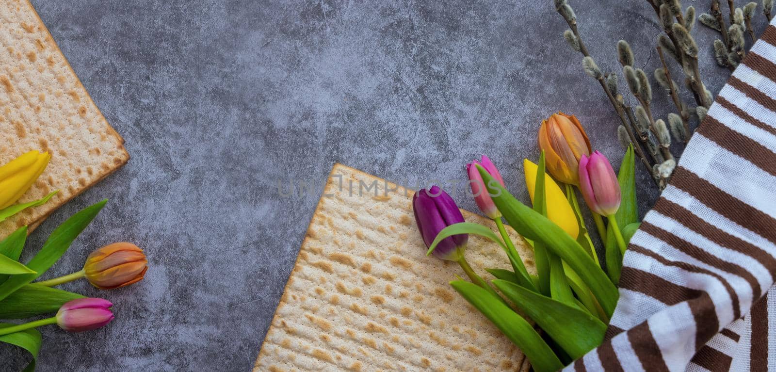 Blessings Pesach Jewish traditional holiday on Passover celebration of flowers and matzah bread by ungvar