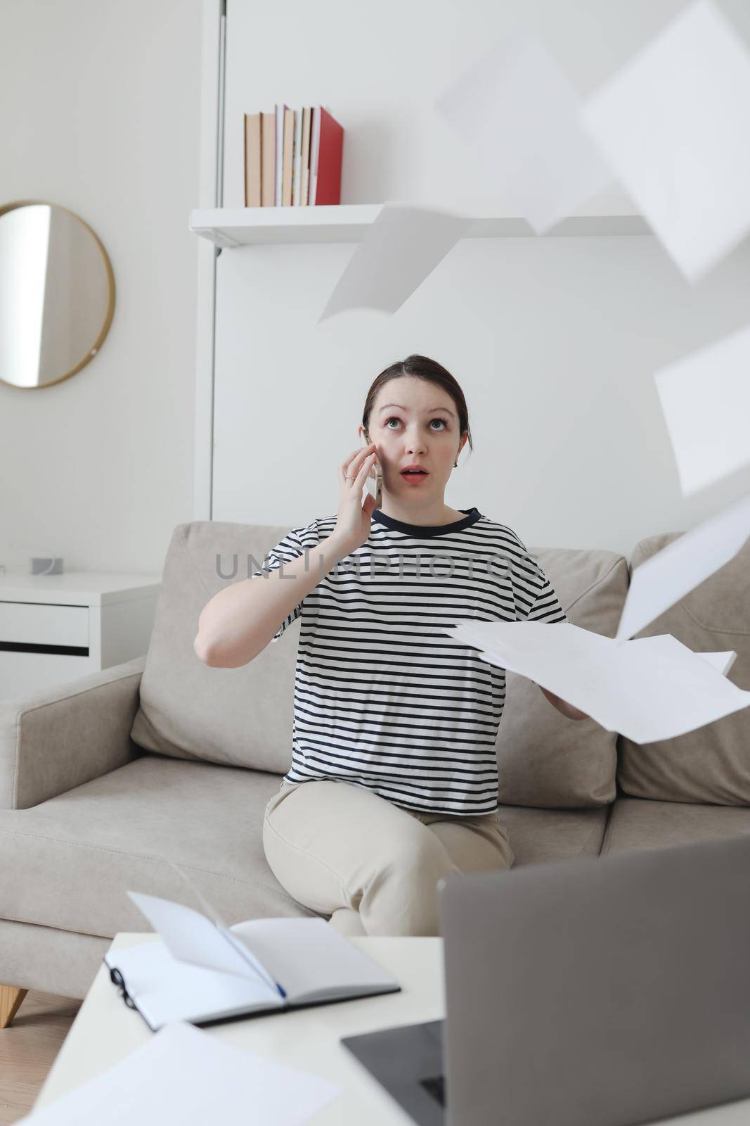 office manager or freelancer in a stylish room. Confident business woman working at workplace in a modern office. Office manager or freelancer work