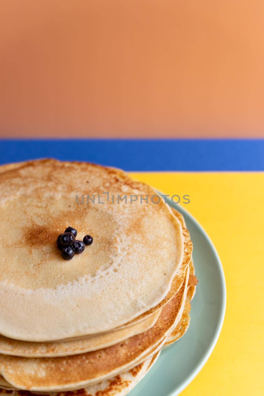 stack of delicious pancakes on a white background, closeup