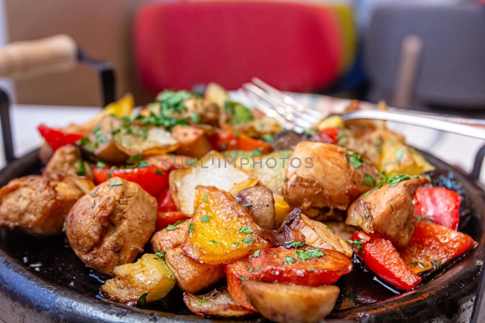 Pan-fried potatoes, meat and vegetables for a large company by Milanchikov