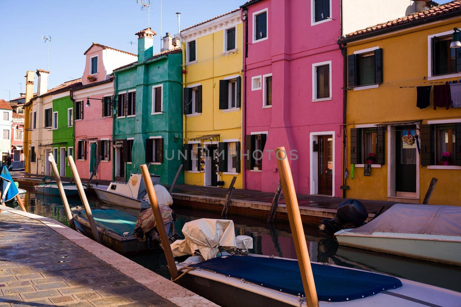 Colorful houses on Burano island by bepsimage