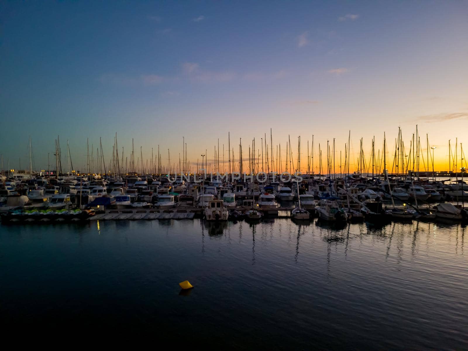 The Mediterranean Sea. Sea marina for yachts in the evening, the sun sets.