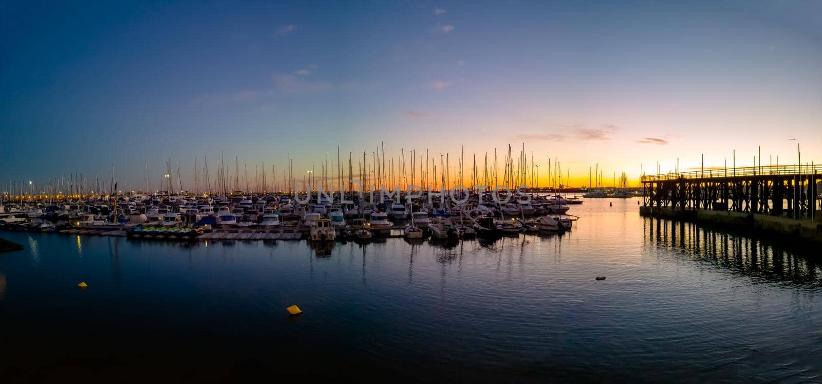 The Mediterranean Sea. Sea marina for yachts in the evening, the sun sets.