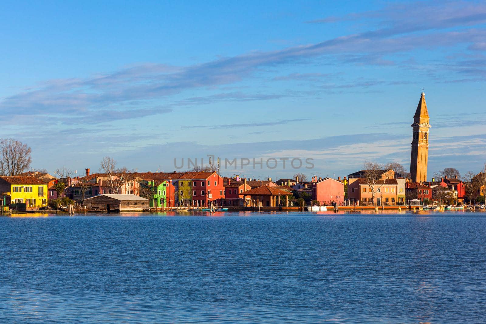 View of the Leaning Bell Tower of the Church of San Martino in Burano Island - Venice Italy
