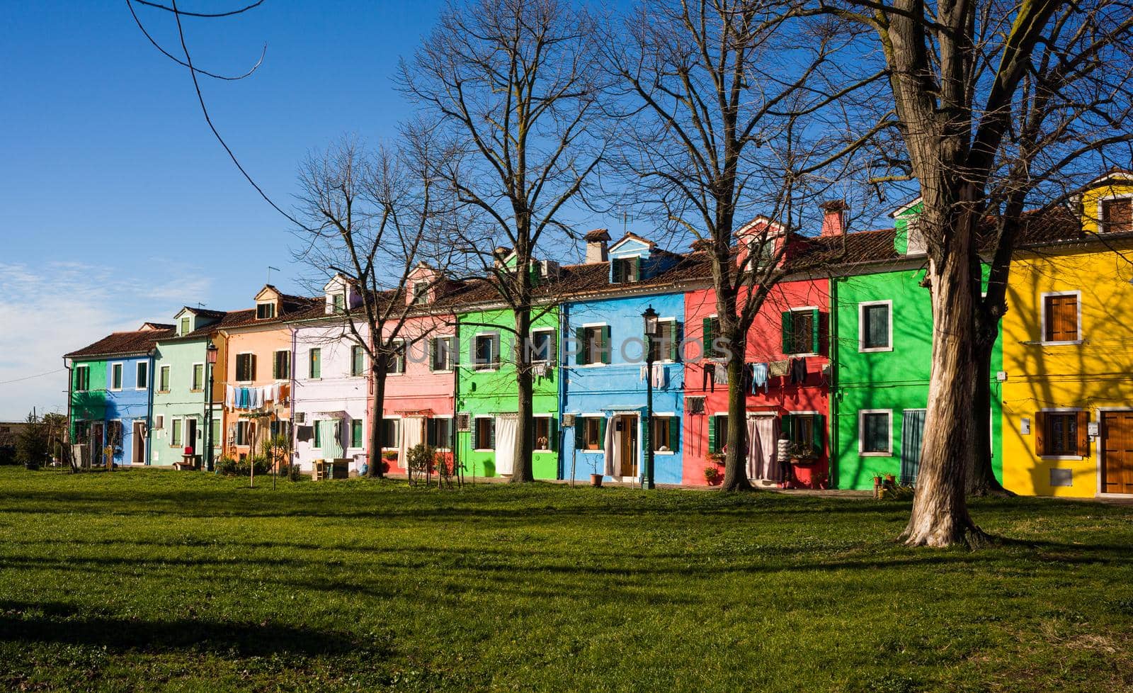 Colorful houses on Burano island by bepsimage