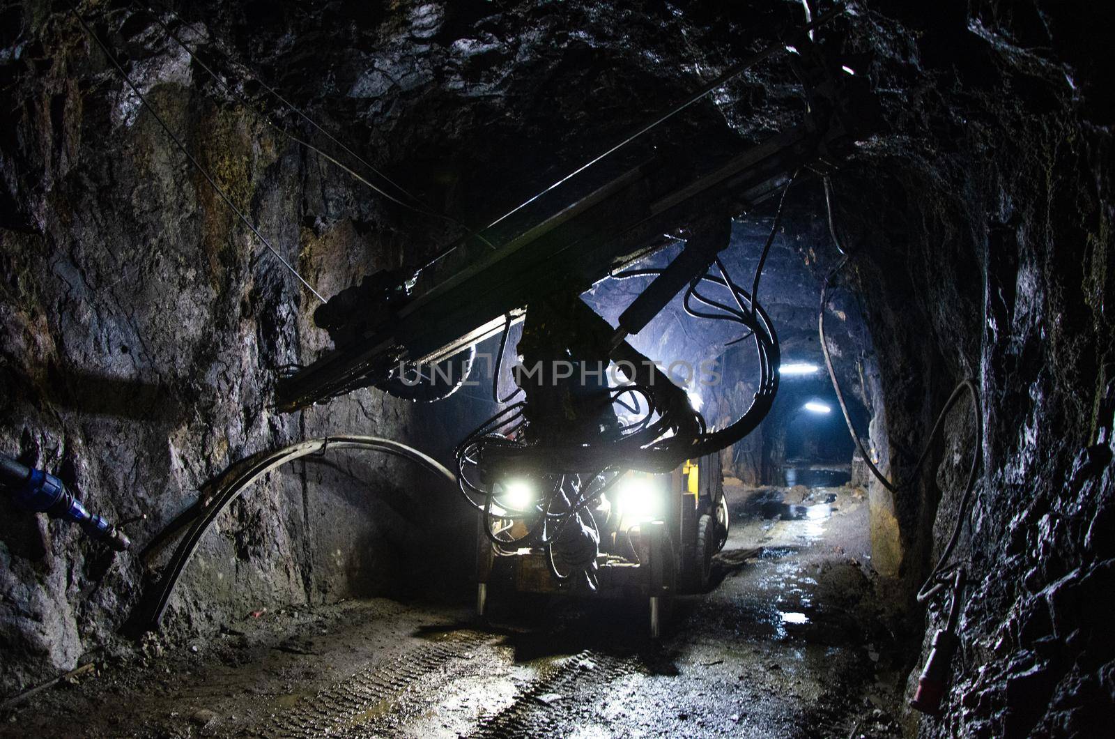 Jumbo Drill Posing at Underground Mine. by Peruphotoart