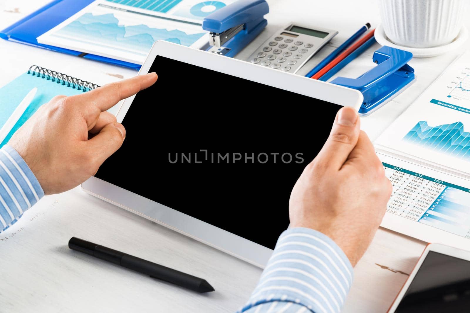 businessman with a tablet, works in the office by adam121