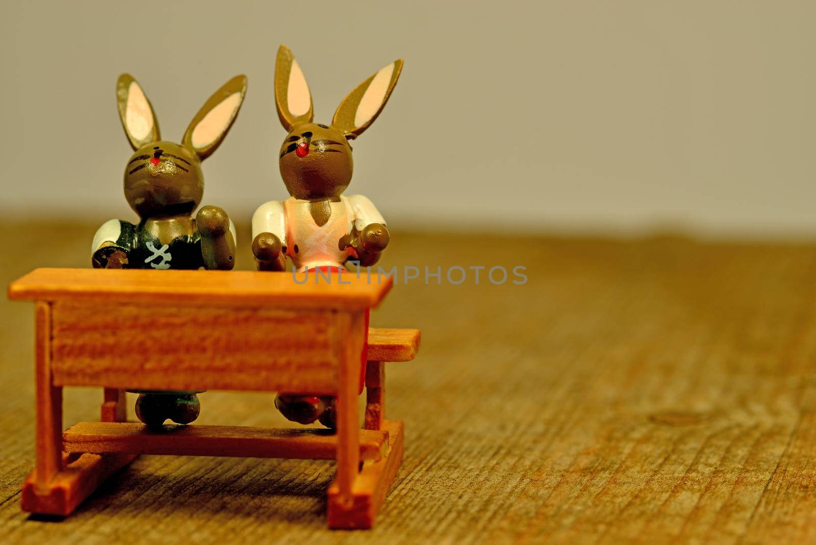 easter bunnies on the school bench