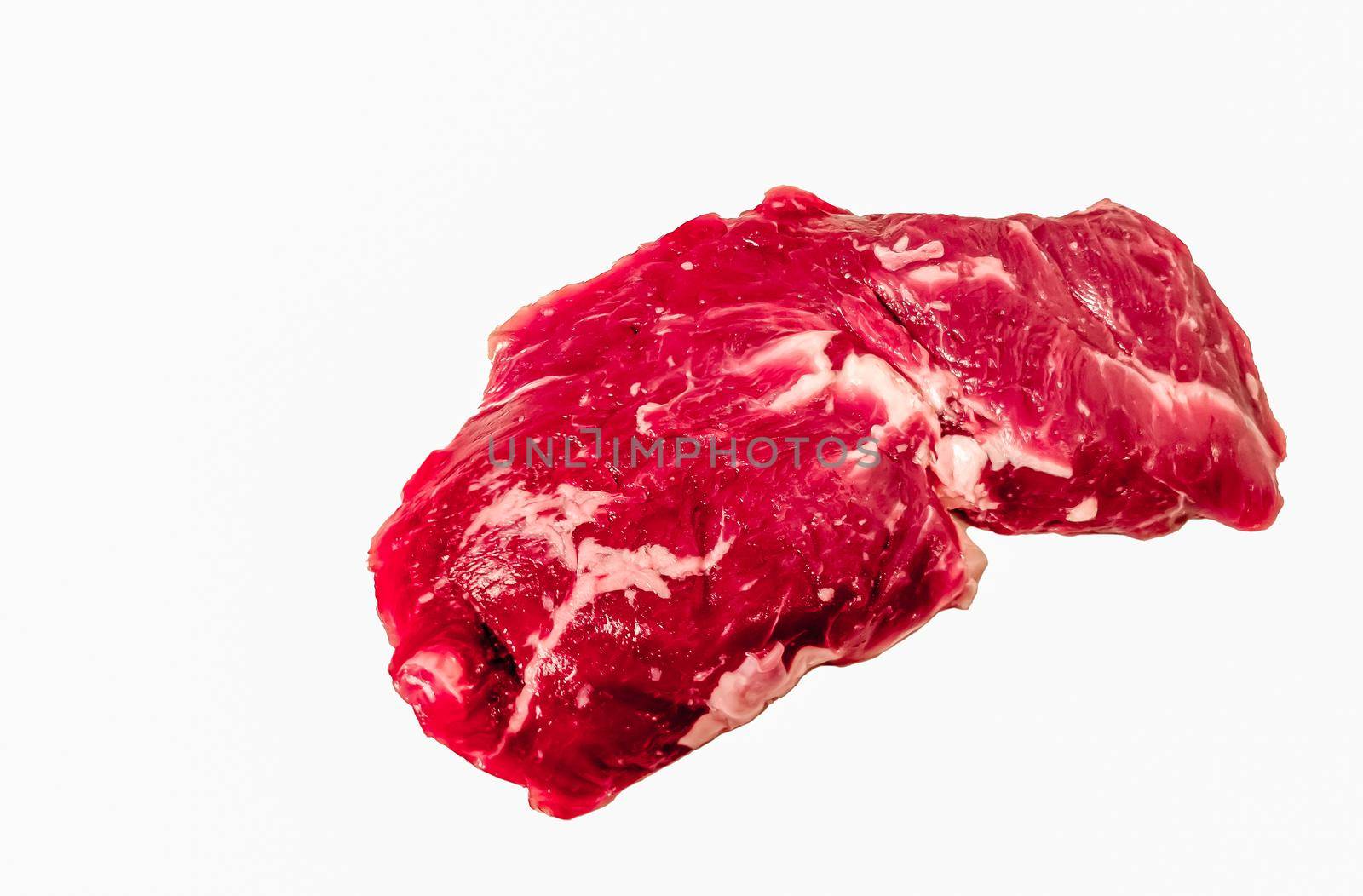 "Spider steak" or "bifteck araignée" of marbled beef on white background. by Milanchikov