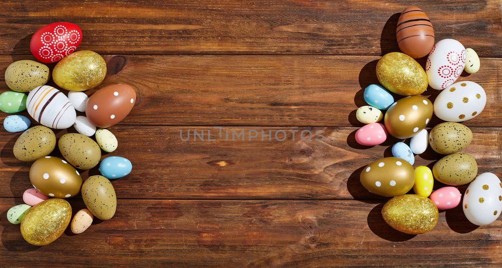 Easter eggs on wooden background . Wooden background. The minimal concept. Top view. Card with a copy of the place for the text. by Maximusnd