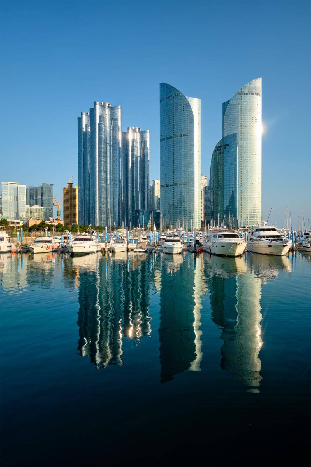 Busan marina with yachts, Marina city skyscrapers with reflection, South Korea