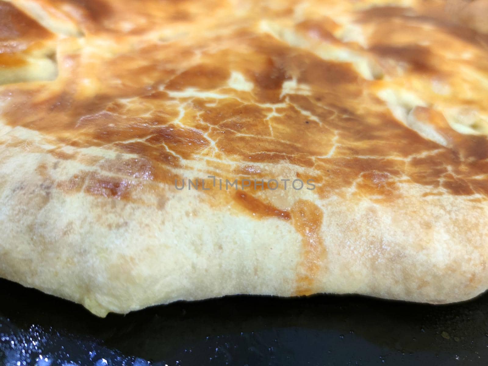 ruddy bread cake close up, homemade baking by Annado