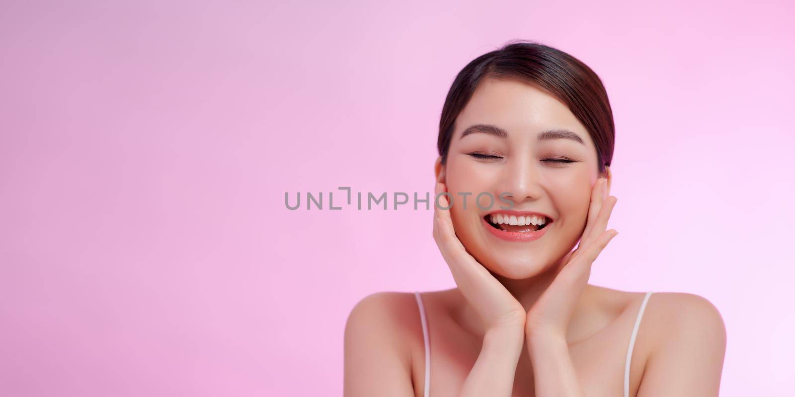 Beauty woman healthy skin concept natural makeup beautiful model girl face hands touching by makidotvn