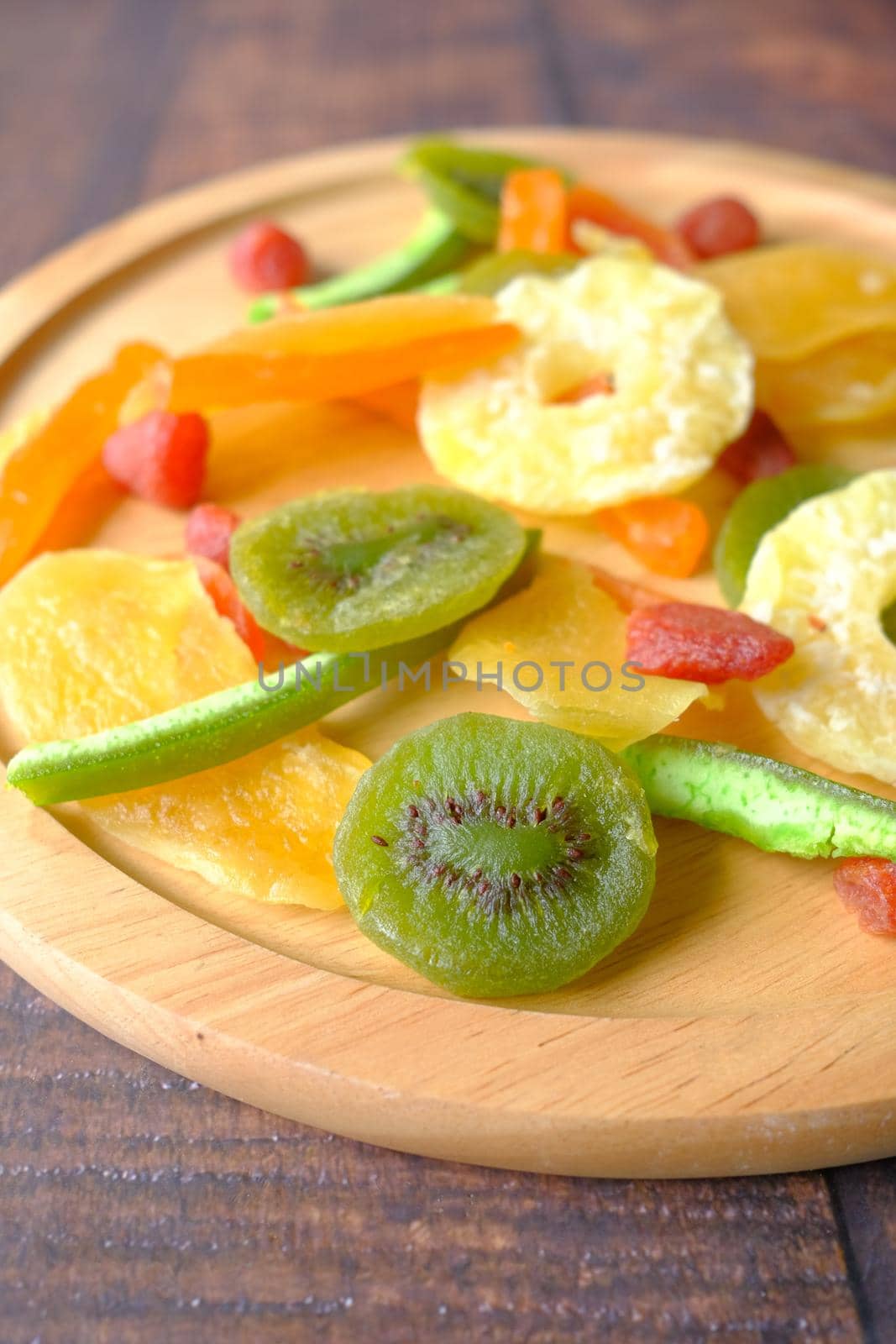 Dried fruits and berries on table .