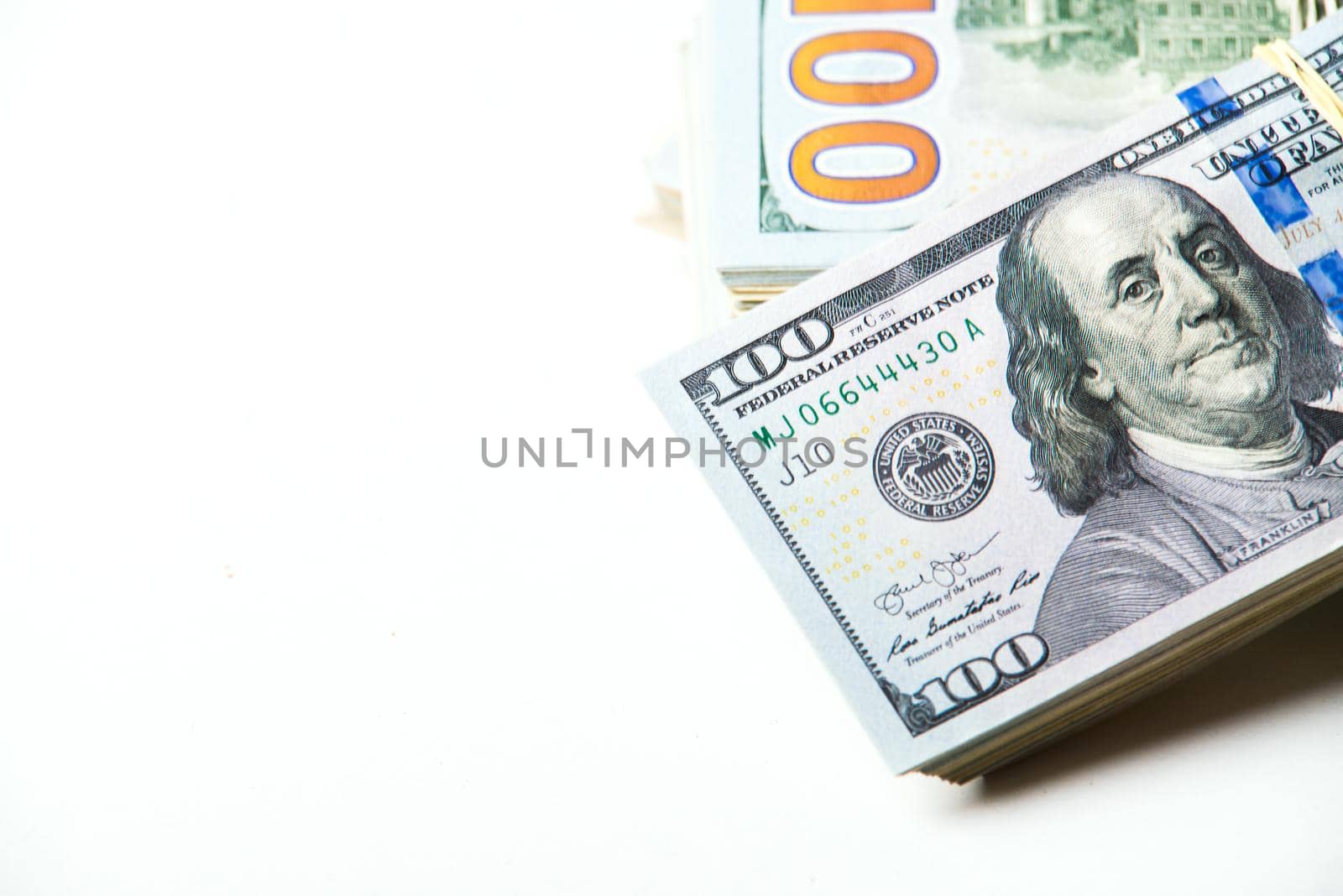 hip of one hundred dollars on white background with copy space