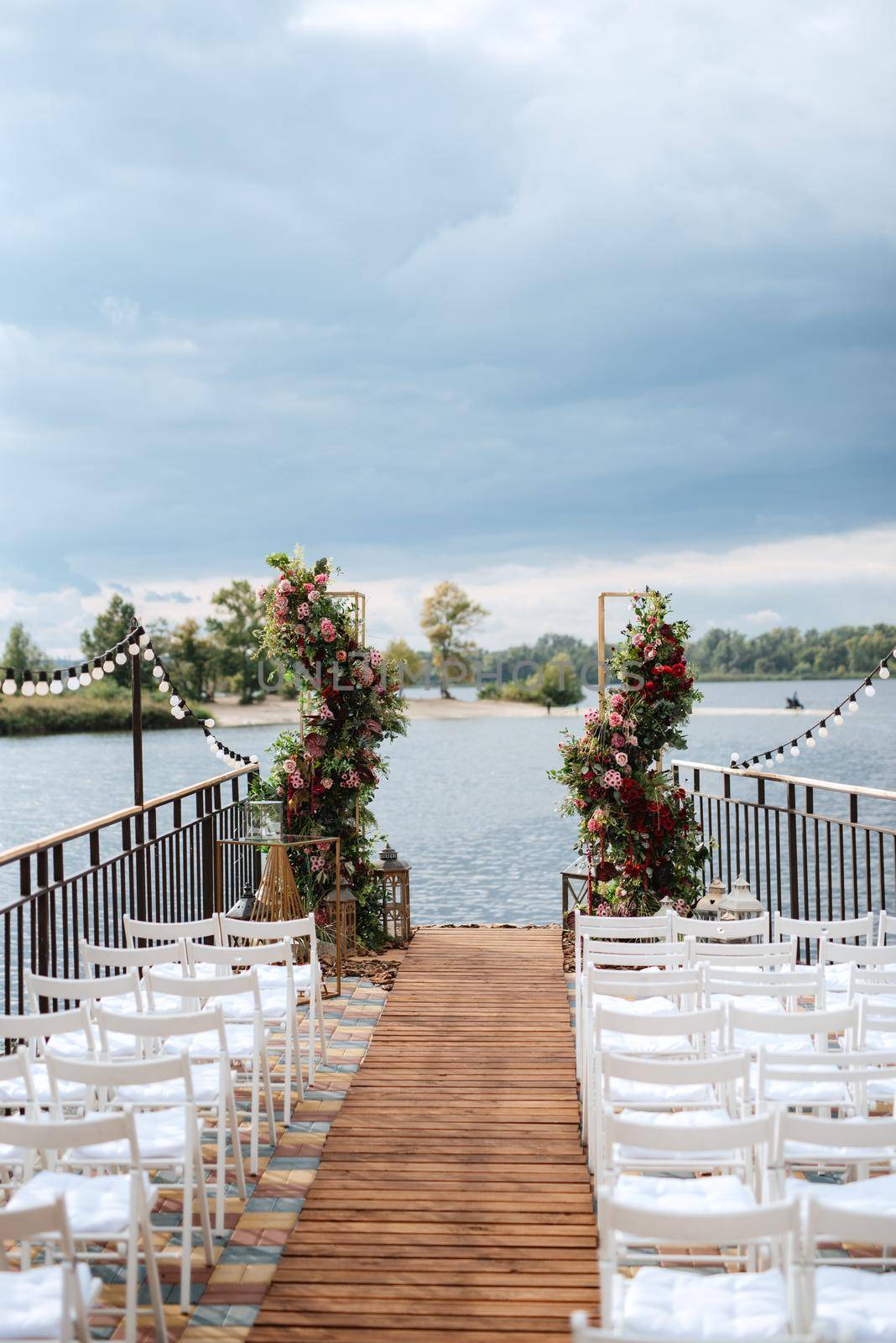 wedding ceremony area, arch chairs decor