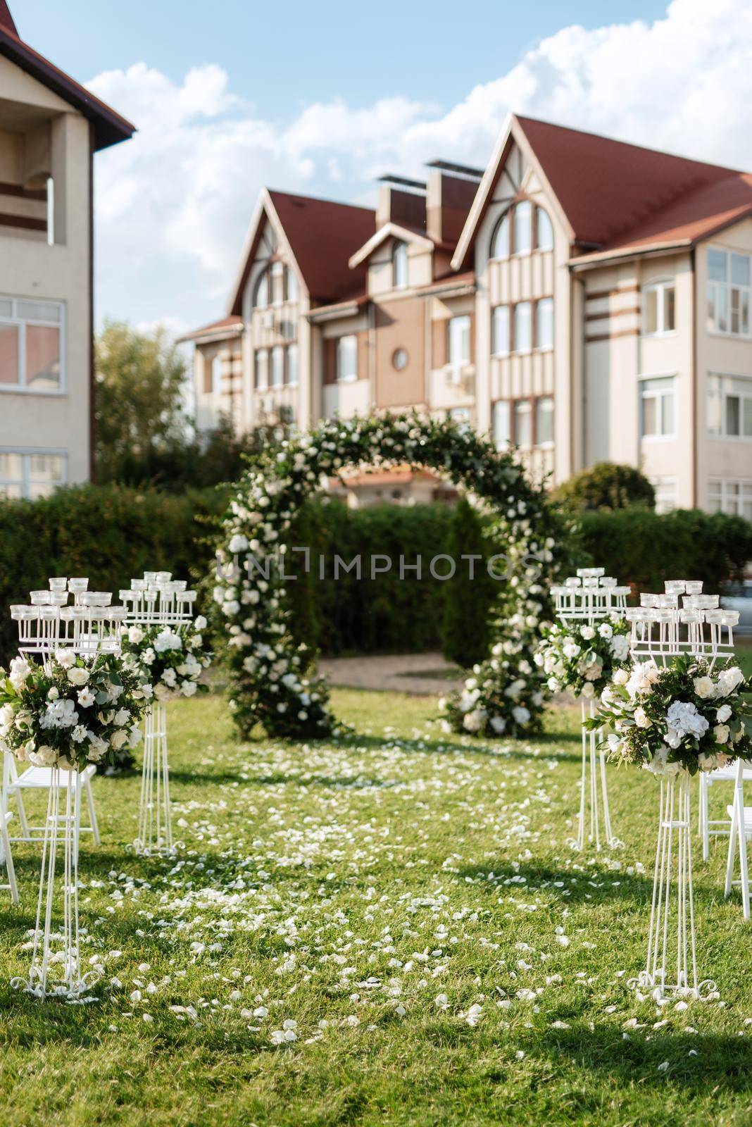 wedding ceremony area, arch chairs decor