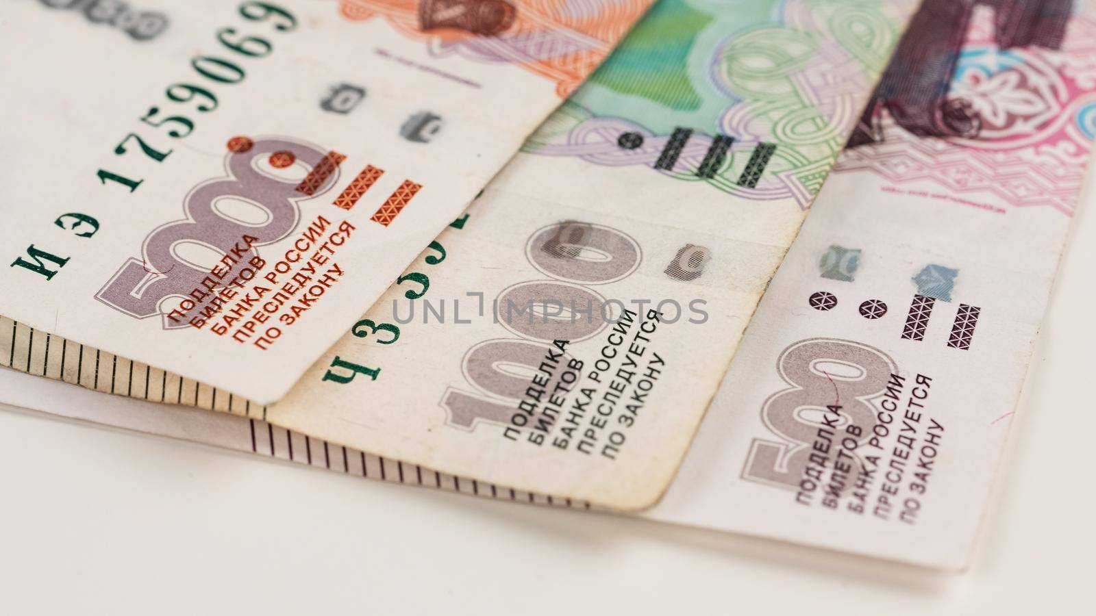 Close-up of banknotes. Five thousand, one thousand, five hundred rubles. by mrwed54