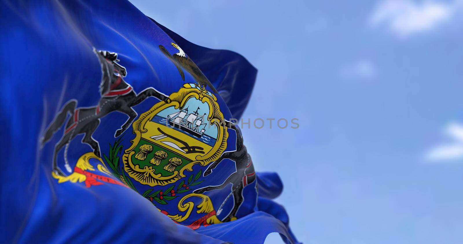 The US state flag of Pennsylvania waving in the wind by rarrarorro