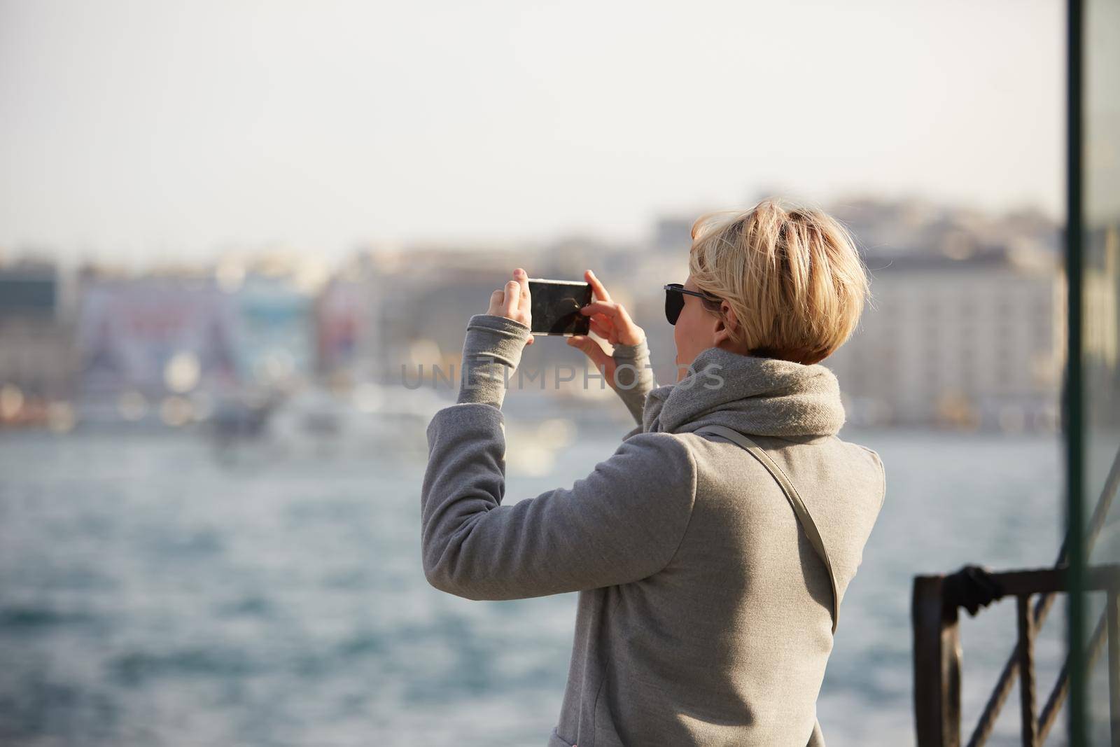 Pretty blonde taking a selfie on a spring day.