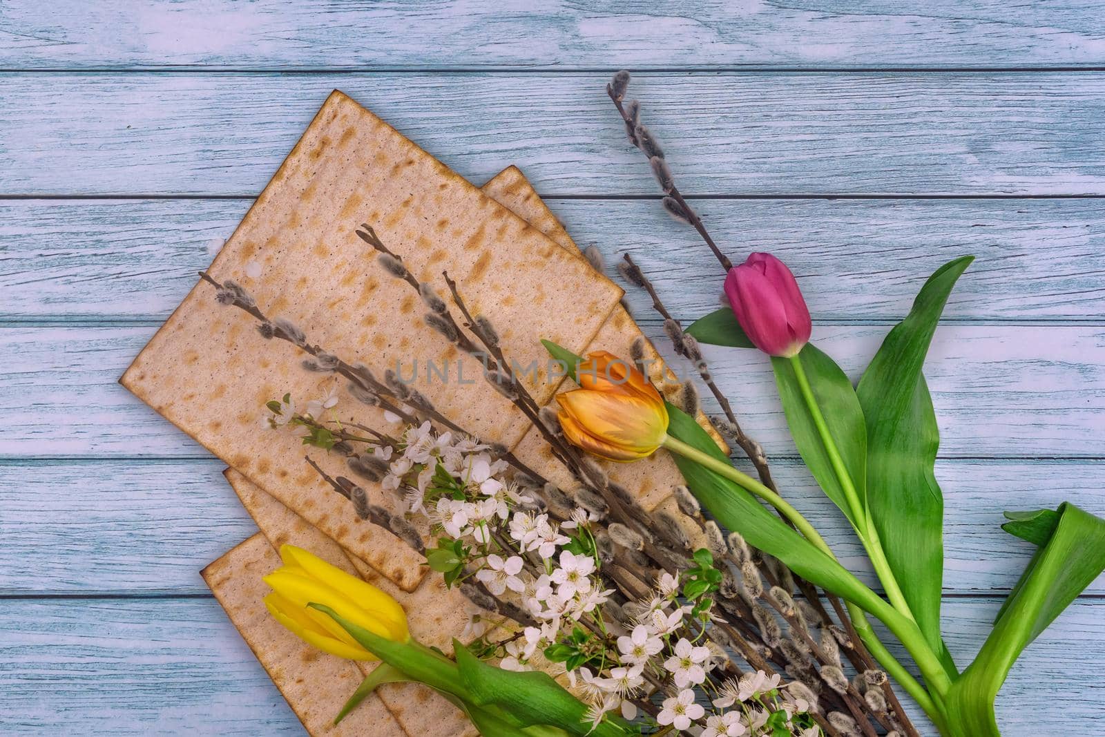Tradition attributes symbols for Passover festival with matzo unleavened bread on preash celebration holiday