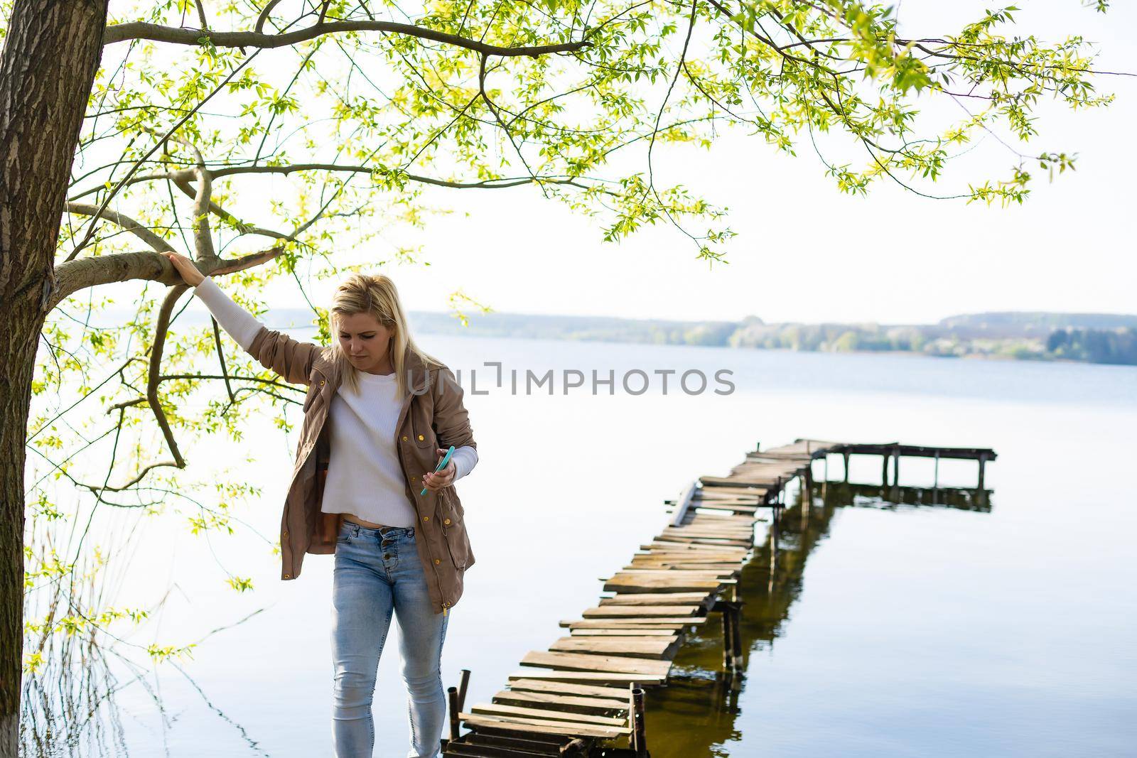 pier, wooden platform panton by the river. by Andelov13