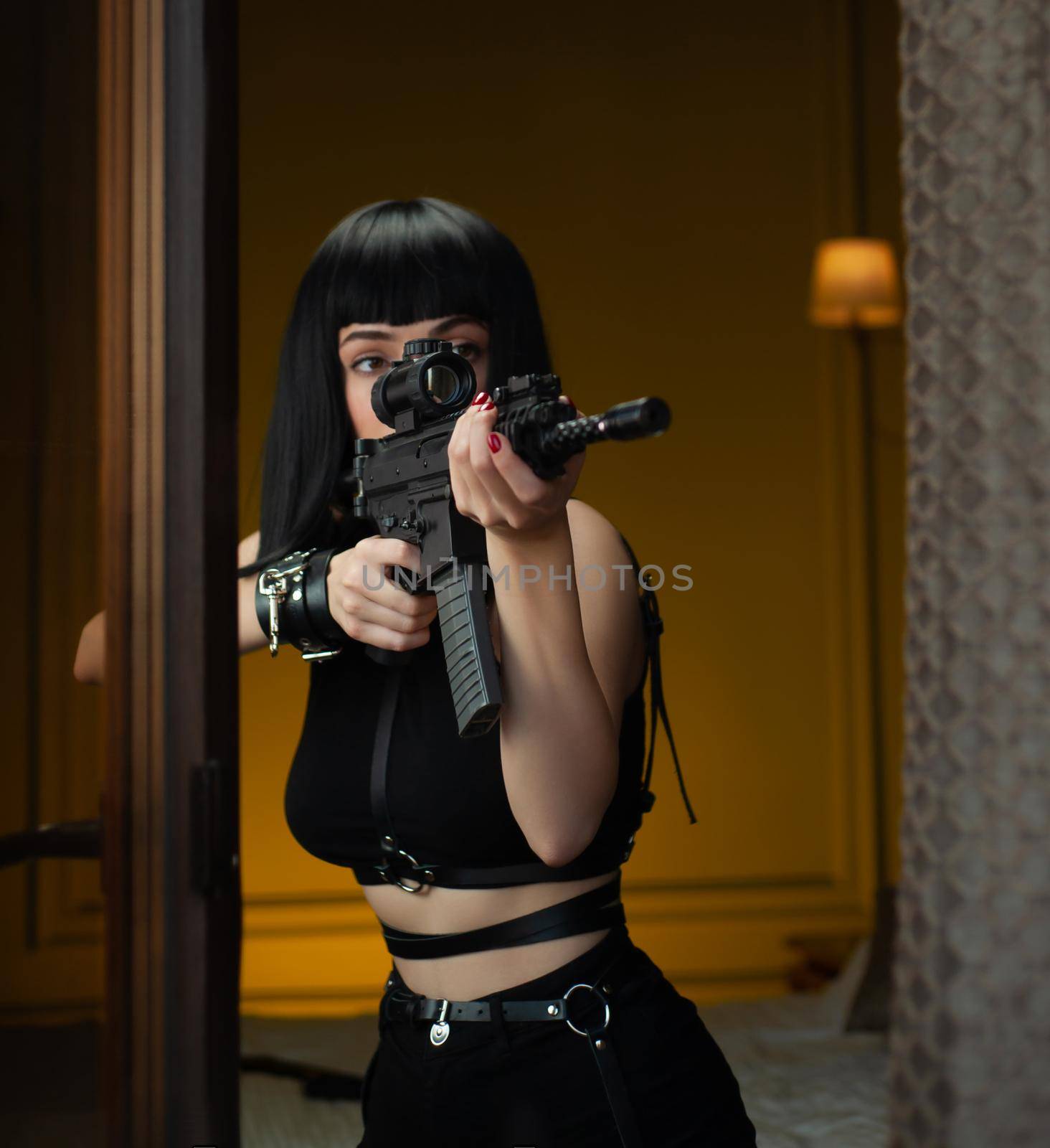 female hitman aims an automatic rifle by Rotozey