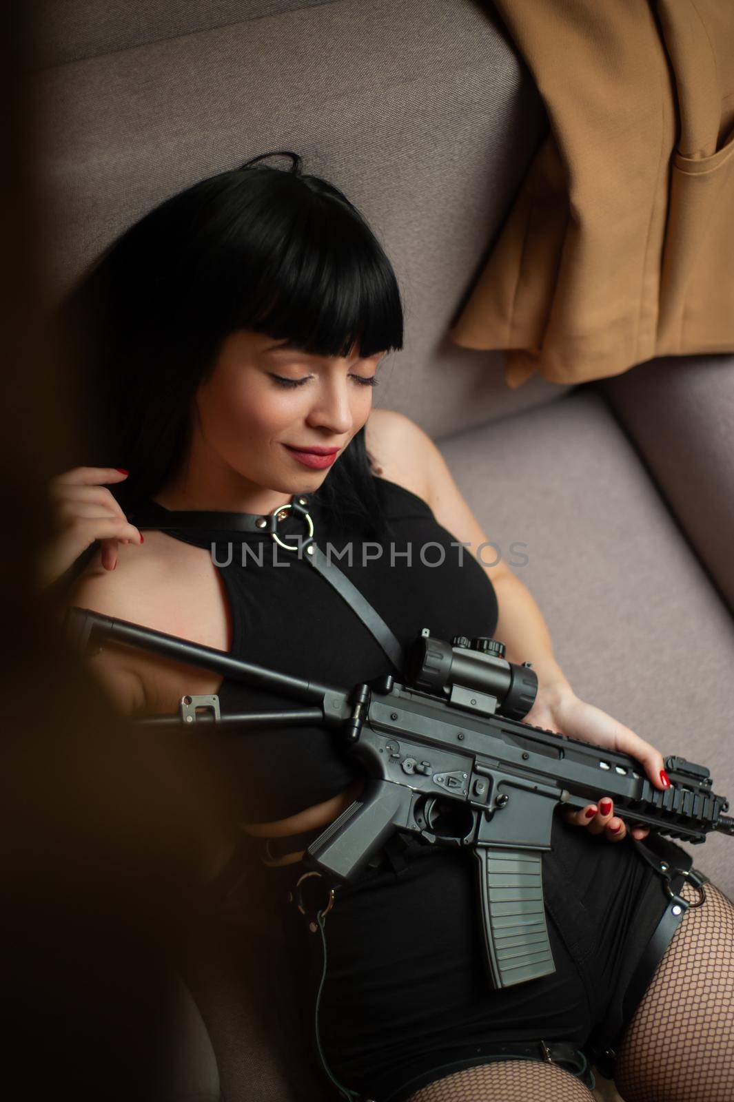 a female hitman in a hotel near the window aims an automatic rifle with a telescopic sight at the victim committing murder by Rotozey