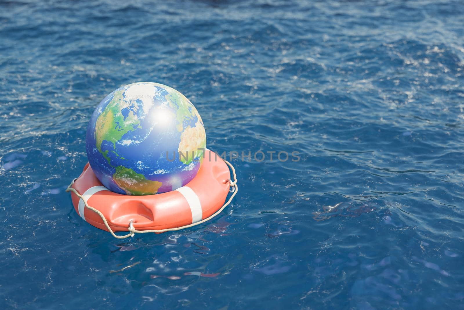 Globe with continents on round red lifebuoy floating on sea with clear and rippling water in nature on summer day. 3d rendering