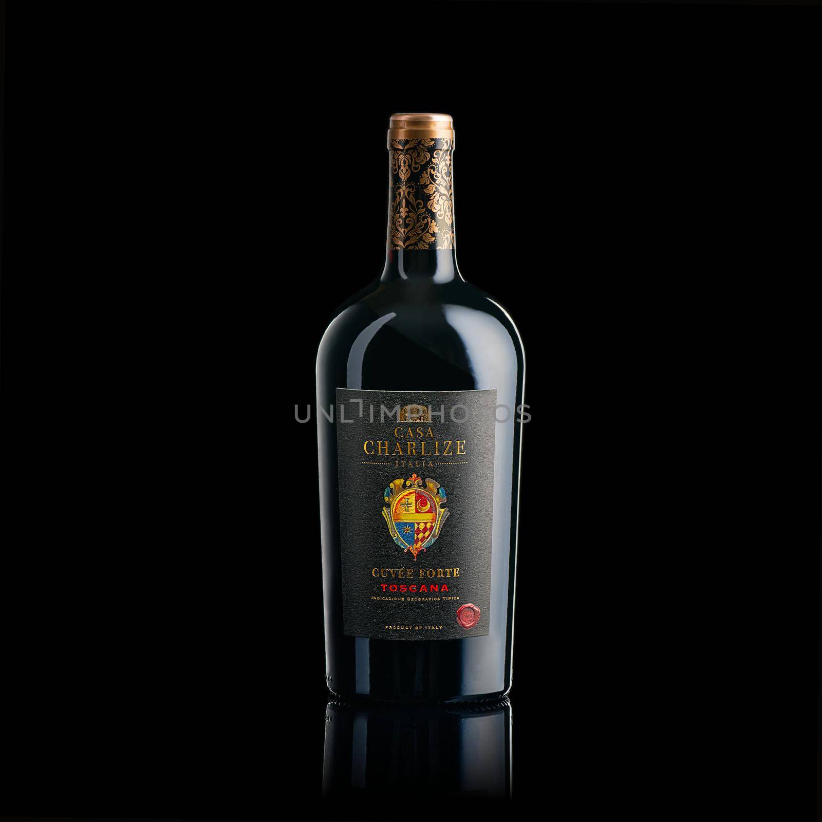 Tallinn, Estonia - March 2022. Casa Charlize. Toscana Red wine Isolated on black. by PhotoTime